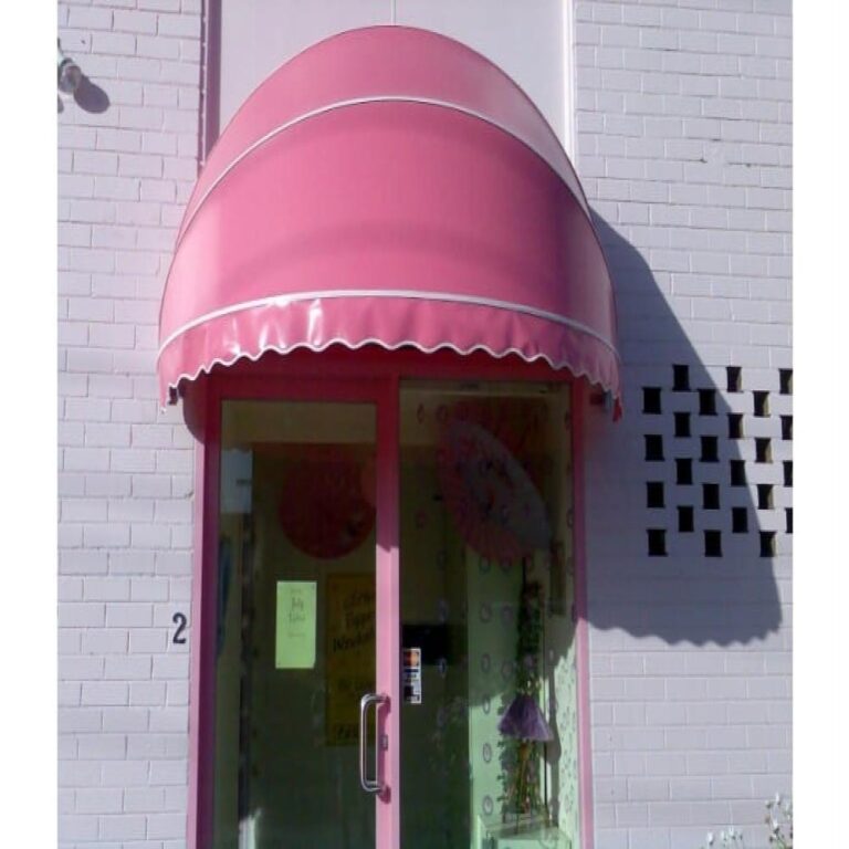 Bright pink dome door awning installed over a commercial shopfront entrance in Melbourne.