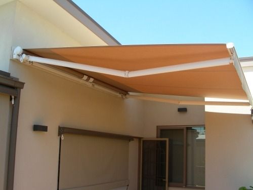 Close-up of solution-dyed acrylic awning fabric on a Melbourne home — showing colour depth and weave texture