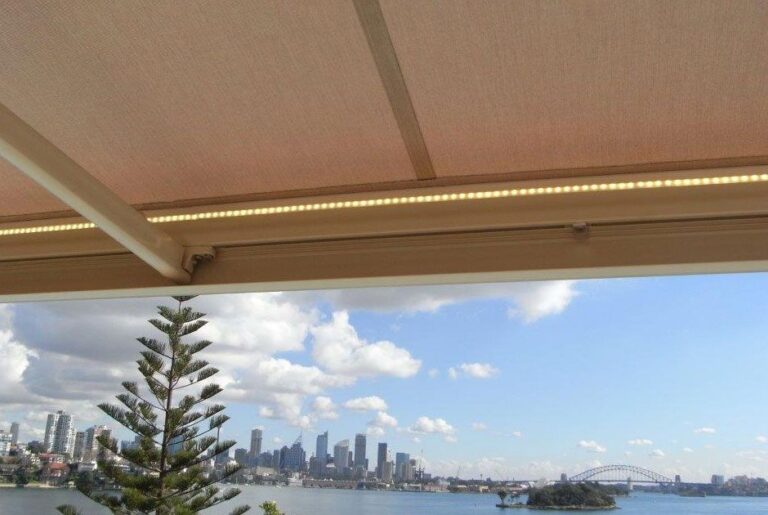 Motorised retractable awning with UV-resistant acrylic fabric extended over a Melbourne outdoor entertaining area
